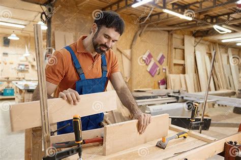 Male Artisan Worker Holding and Assembling Pieces of Wood Using Glue Stock Photo - Image of ...