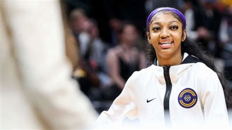 LSU's Angel Reese talks historic win, gets surprise reunion with cousin — UConn's Jordan Hawkins ...