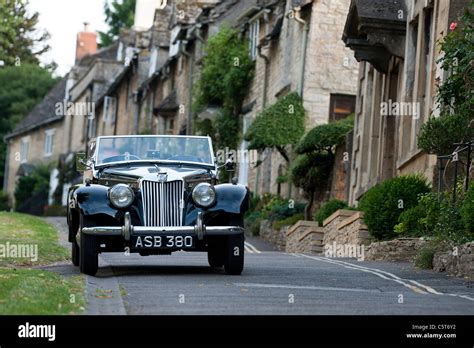 1955 Vintage Mg Tf 1500 Car Parked Outside Houses In The Medieval Town