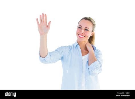 Blonde Woman With Hand Raised Stock Photo Alamy
