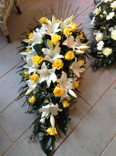 Funeral Flowers White Lily And Yellow Rose Funeral Spray Casket Spray Funeral Flowers