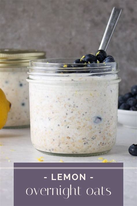 Blueberries And Lemons Sit Next To Two Jars Of Overnight Oatmeal