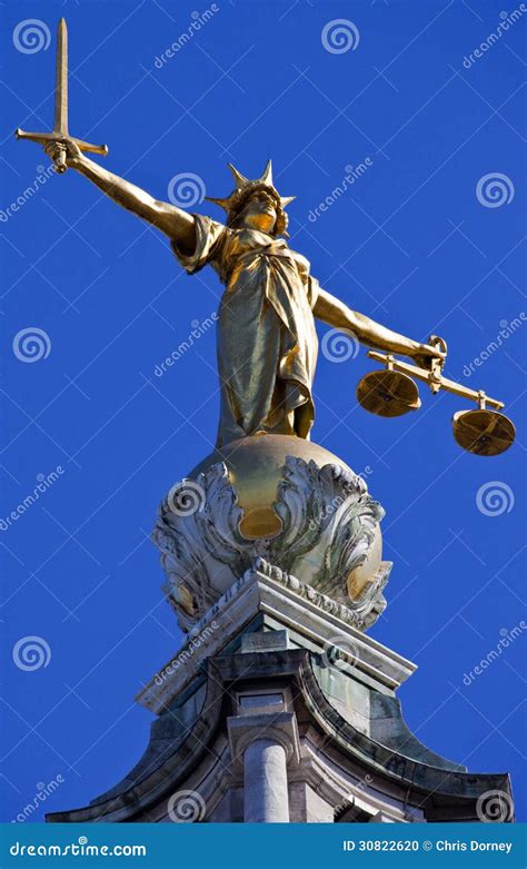 Lady Justice Statue Ontop Of The Old Bailey In London Stock Photo