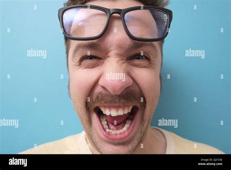 Man with big teeth hi-res stock photography and images - Alamy