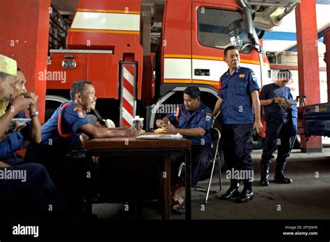Firefighters Having A Relax Time At Their Station In Petojo Central