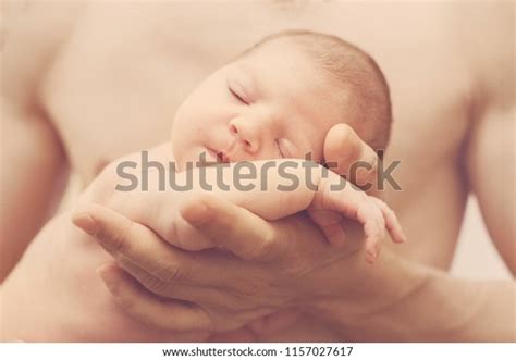 Naked Tiny Newborn Baby Daddys Hands Stock Photo 1157027617 Shutterstock