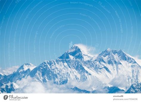 Mount Everest himalaya range aerial view from a plane - a Royalty Free Stock Photo from Photocase