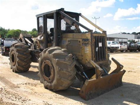 Cat 518 Grapple Skidder Jm Wood Auction Company Inc