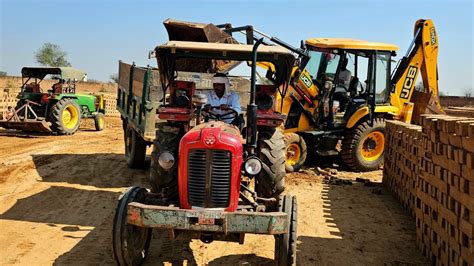 Jcb 3dx Backhoe Eco Machine Loading Mud In Massey 241 And John Deere