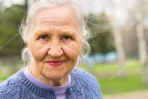 Portrait Smiling Elderly Woman Stock Photo By ©artanika 16270615