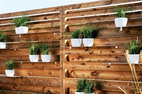 15 Super Unique Fence Planters Thatll Have You Loving Your Privacy