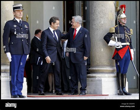 Nicolas Sarkozy, President of France and Sebastian Pinera, President of Chile greet one another ...