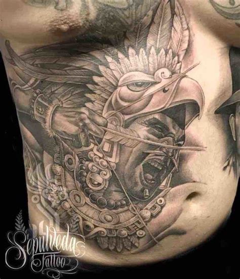 50 Of The Best Aztec Tattoos Tattoo Insider Aztec Warrior Tattoo Mayan Tattoos Aztec