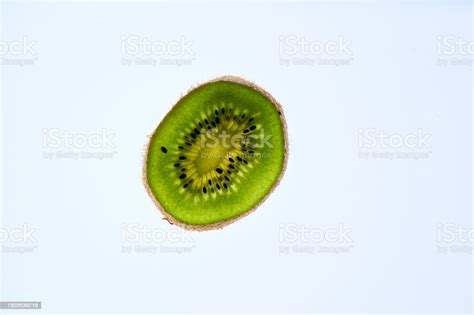 Close Up Photo Of Kiwi On White Background Kiwi Fruit Cut In Half With