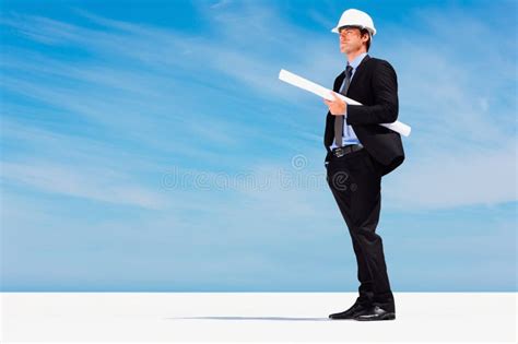 Engineer With Helmet Blueprint And Thinking With Blue Sky Mock Up Or