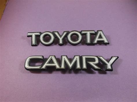 87 91 Toyota Camry 2 Pc Trunk Lid Emblem Rear Logo Badge Nameplate Set