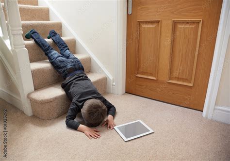 Child falling down the stairs Stock Photo | Adobe Stock