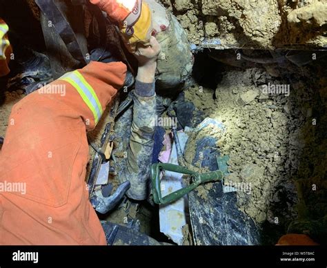 Chinese Rescuers Search For Survivors At The Accident Site After A