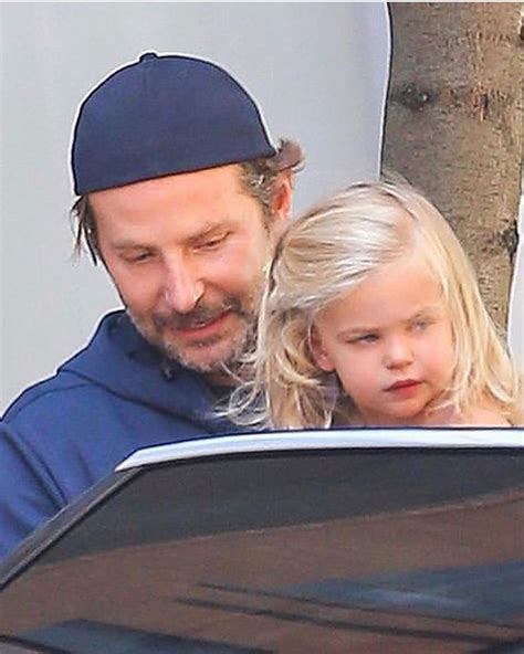 BradleyCooper Fan on Instagram: “|July 19,2019| Bradley has his hands full as he carried ...