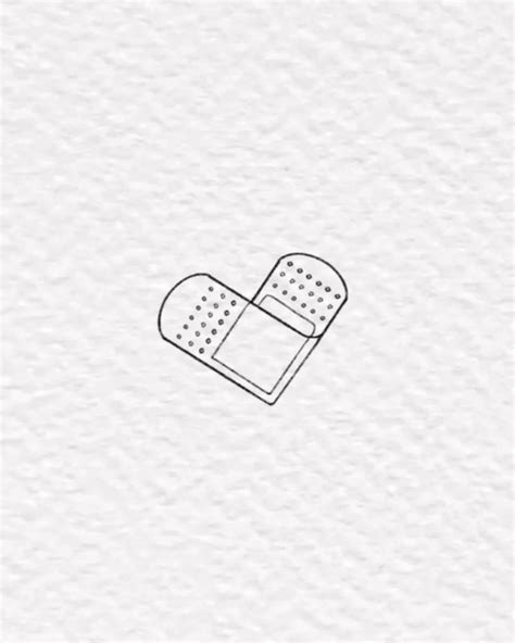 Heart bandaid tattoo in 2023 | Bandaid tattoo, Sibling tattoos, Small ...