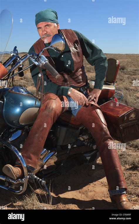 Man Leaning Against Motorcycle Hi Res Stock Photography And Images Alamy