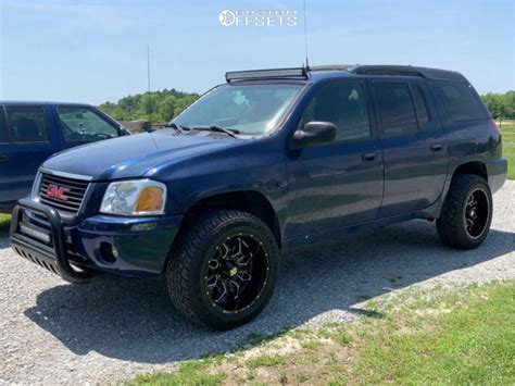 2004 Gmc Envoy Xuv With 20x10 24 Havok H109 And 275 55r20 Travelstar At701 And Suspension Lift