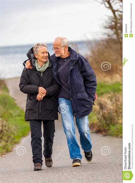 Happy Mature Couple Relaxing Baltic Sea Dunes Stock Photo Image Of Active Retiree
