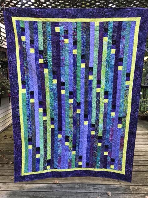 Stunning Vertical Jelly Roll Race Quilt