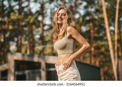 Cheerful Blonde Lady Standing By Her Stock Photo Shutterstock