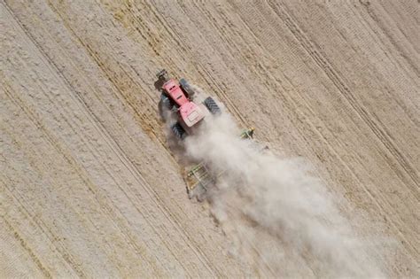 Top View Tractor Planting Corn Seed Field High Angle View Stock Photo