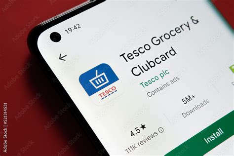 Tesco Clubcard App Seen In Google Play Store On The Smartphone Screen