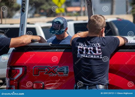 Rear View of One Firefighter with a Shirt with Ventura City Fire ...