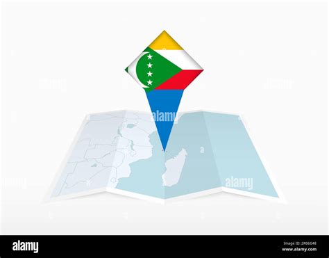 Comoros Is Depicted On A Folded Paper Map And Pinned Location Marker