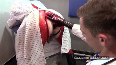Guyzin2Rubber Fetish Clinic Sees Dr Bennett Man Handling His Patient S Huge Cock Both In Hot