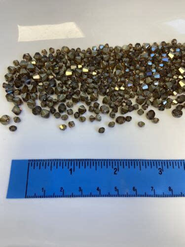 Swarovski Crystal 6mm 4mm Bronze Shade Bicone Beads EBay