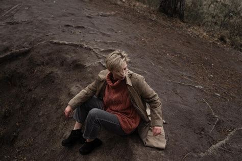 Premium Photo Young Woman Standing In Forest