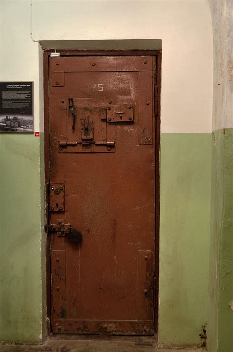 Former Kgb Headquarters In Vilnius The Door Of A Lukiskes Prison Cell Photograph By Ricardmn