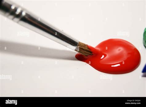 Paintbrush In Red Paint Stock Photo Alamy