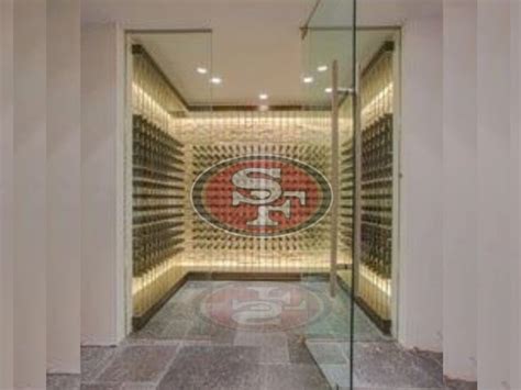 The Inside Of A Wine Cellar With Glass Walls