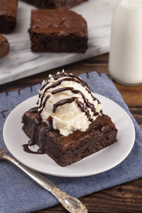 Double Chocolate Brownies Sundae With Vanilla Ice Cream On Top Stock