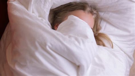 Yawning Girl Lying In Bed On Pillow Covering Her Face With Blanket Stock Footage Video Of