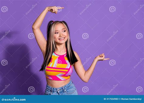 Photo Of Positive Pretty Cute Girl Wear Trendy Clothes Demonstrate