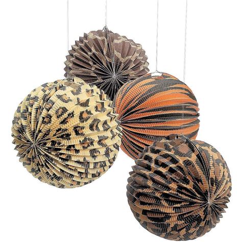 Three Decorative Balls Hanging From Strings On A White Background Each