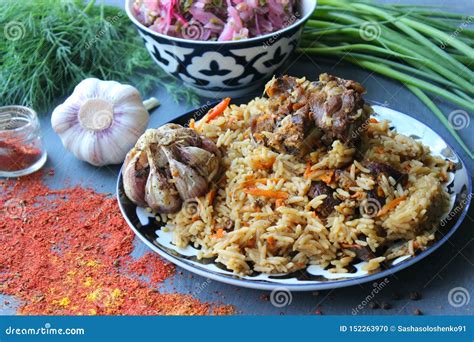 The Concept Of Oriental Cuisine Homemade Uzbek Lamb Pilaf Is Served On