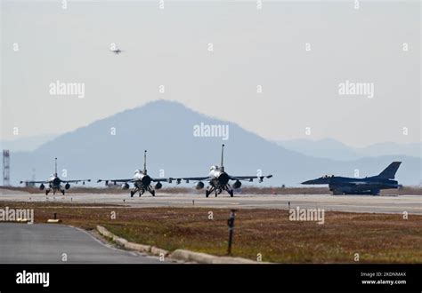 Four F 16 Fighting Falcons Assigned To The 80th Fighter Squadron Taxi