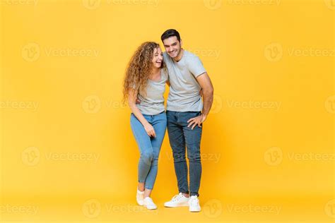 Full Length Portrait Of Young Happy Interracial Millennial Couple