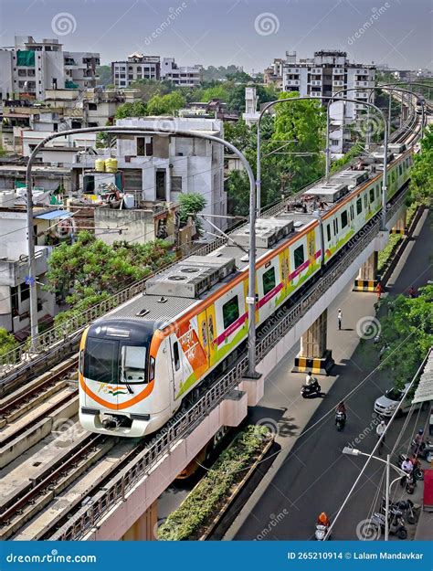 Colorful Metro Train Passing Over Elevated Corridor In Nagpur Editorial