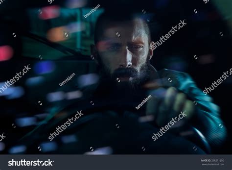 Serious Young Man Driving Car Night Stock Photo 256211650 | Shutterstock