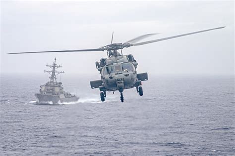 An MH 60S Sea Hawk Approaches The Flight Deck Of The Aircr Flickr