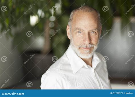 Closeup Of A Mature Man Smiling At The Camera Stock Photo Image Of